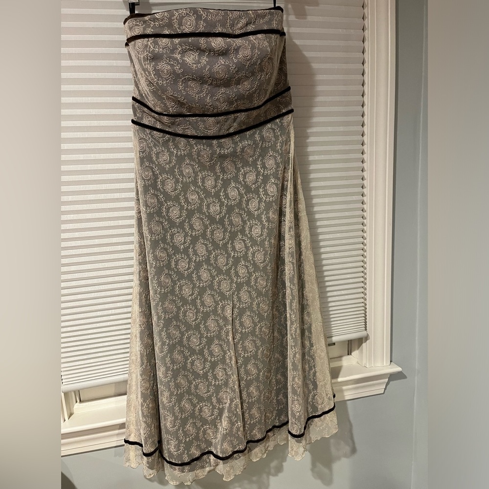 Vintage inspired strapless dress with boning and delicate lace overlay